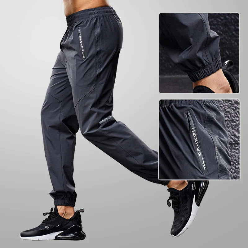 Herren Laufhose – Atmungsaktives Funktionsgewebe – Schmaler Schnitt – Zipper-Taschen