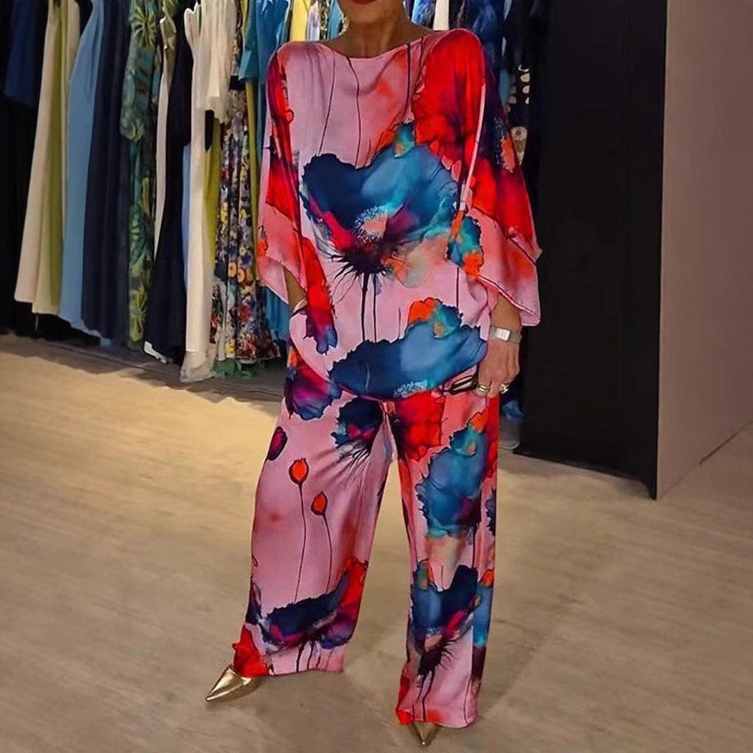 Damen Zweiteiler Set – Off Shoulder Top mit Fledermausärmeln – Weite High-Waist Hose – Seidenähnlich – Künstlerischer Print