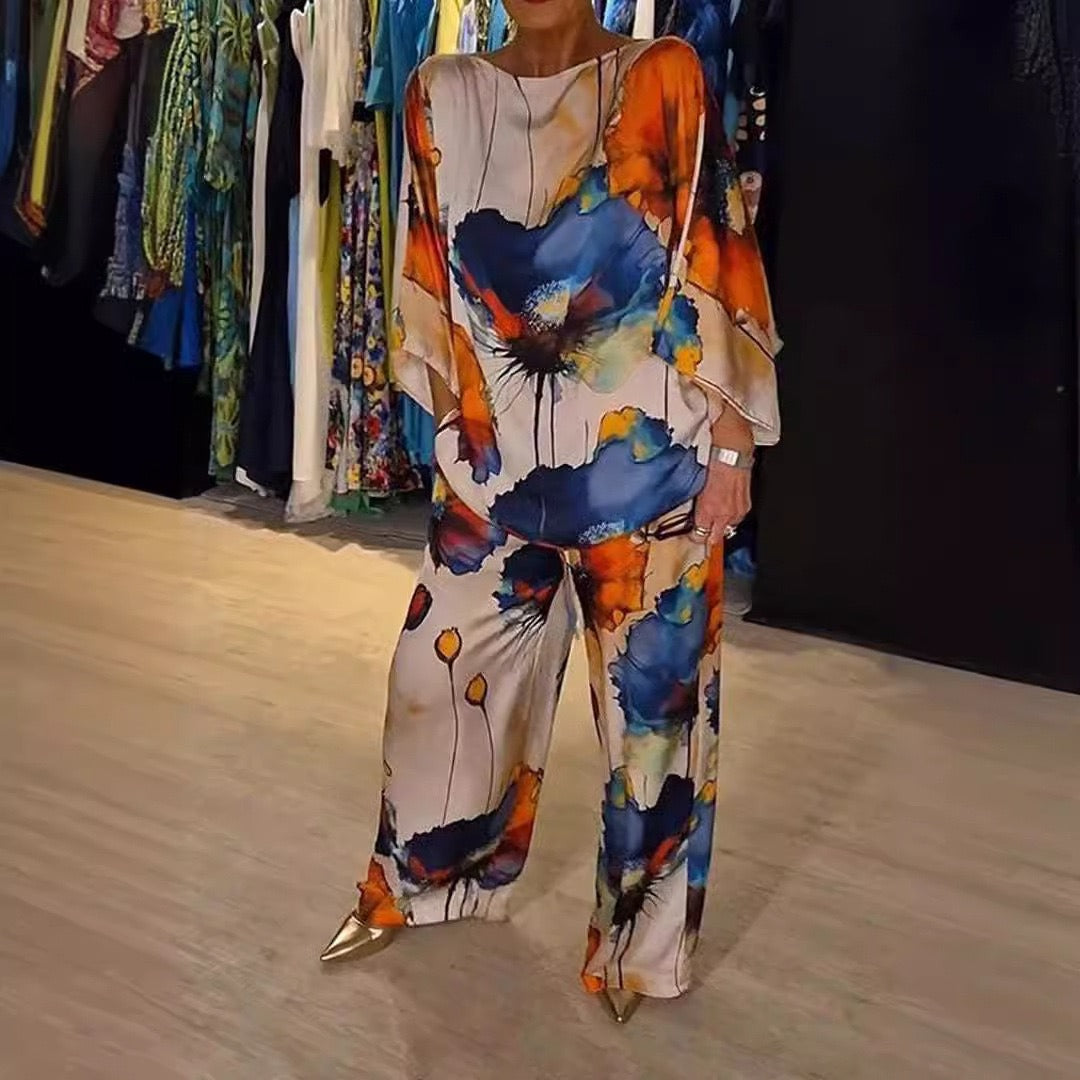 Damen Zweiteiler Set – Off Shoulder Top mit Fledermausärmeln – Weite High-Waist Hose – Seidenähnlich – Künstlerischer Print
