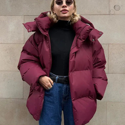Damen Steppjacke – Oversized Passform – Mit Kapuze – Mittellanger Schnitt – Warm gefüttert