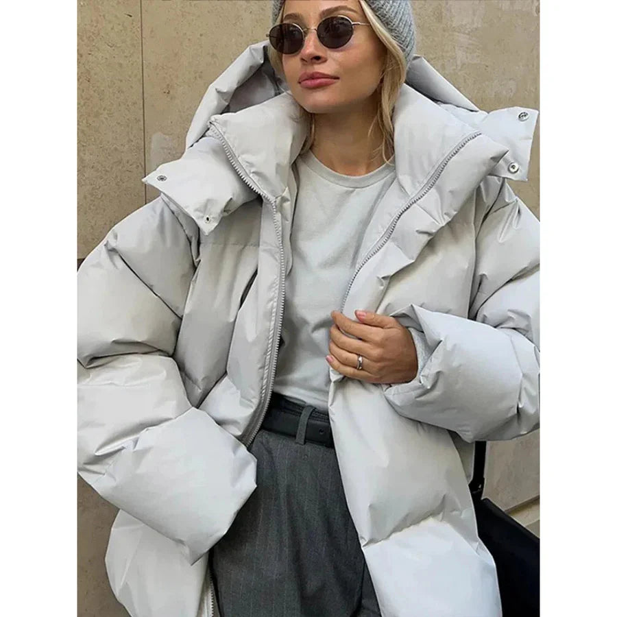 Damen Steppjacke – Oversized Passform – Mit Kapuze – Mittellanger Schnitt – Warm gefüttert