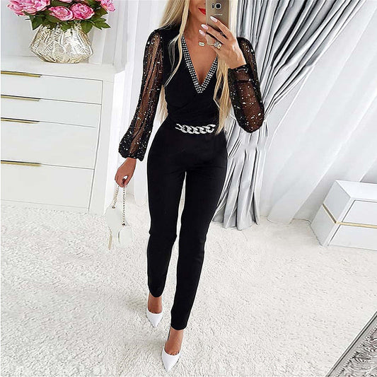 Damen Jumpsuit – Slim Fit – V-Ausschnitt mit Diamantdetails – Lange transparente Ärmel – Kettengürtel