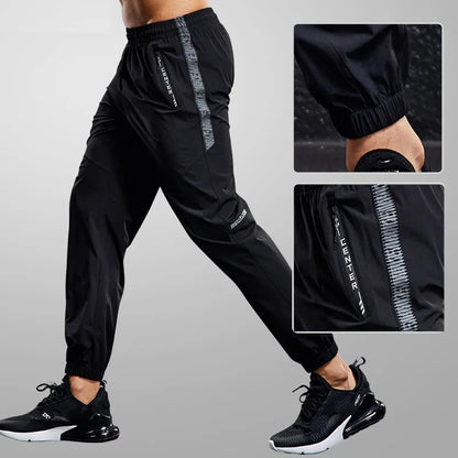 Herren Laufhose – Atmungsaktives Funktionsgewebe – Schmaler Schnitt – Zipper-Taschen