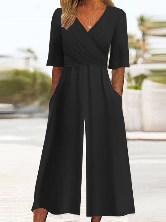 Damen Jumpsuit – Relaxed Fit – Wickel-V-Ausschnitt – Halbarmlänge – Atmungsaktives Gewebe – Seitentaschen