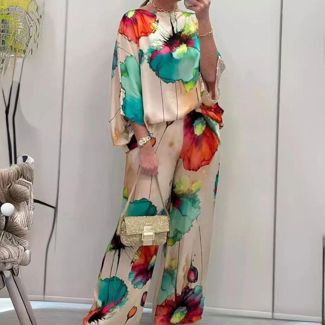 Damen Zweiteiler Set – Off Shoulder Top mit Fledermausärmeln – Weite High-Waist Hose – Seidenähnlich – Künstlerischer Print